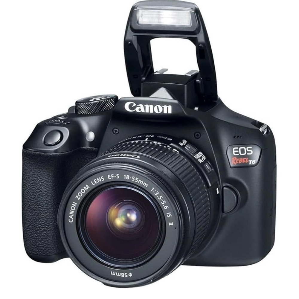 Canon Digital Camera with Interchangeable Lenses and LCD Screen with strap & bag